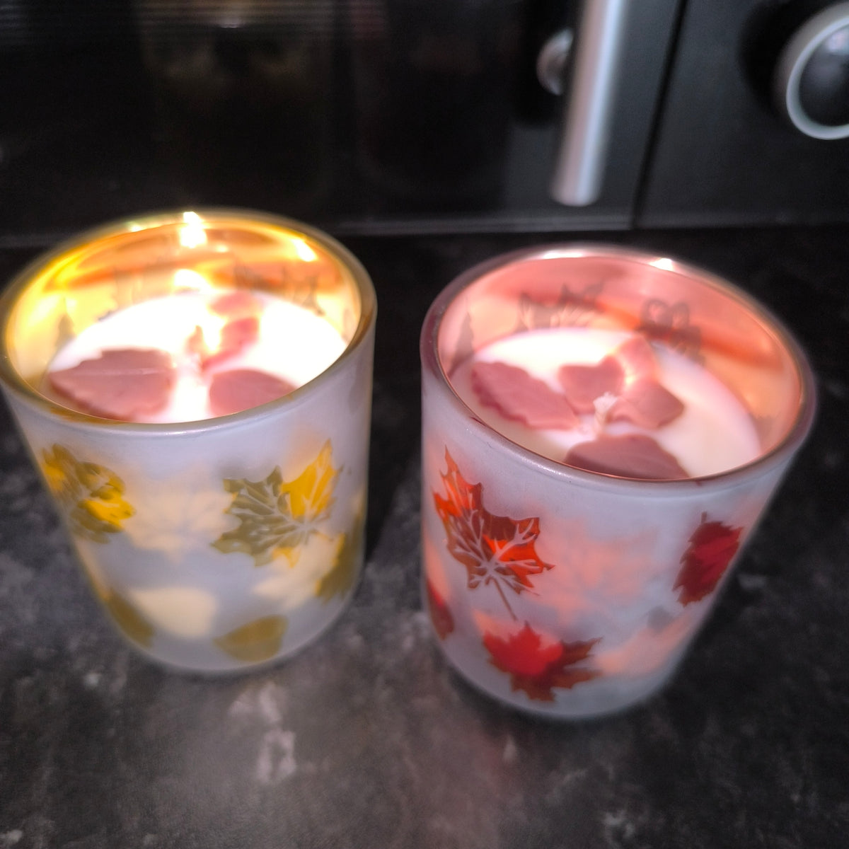 Candles in a cute leaf glass.