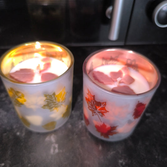 Candles in a cute leaf glass.